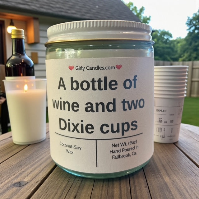 A bottle of wine and two Dixie cups