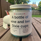 A bottle of wine and two Dixie cups - Girly Candles