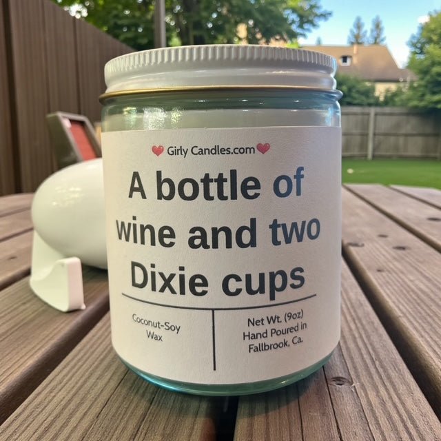 A bottle of wine and two Dixie cups - Girly Candles