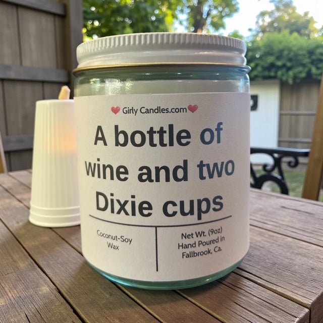 A bottle of wine and two Dixie cups - Girly Candles